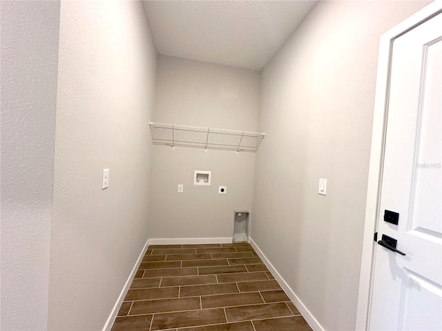 laundry room with laundry area, baseboards, hookup for a washing machine, wood tiled floor, and hookup for an electric dryer