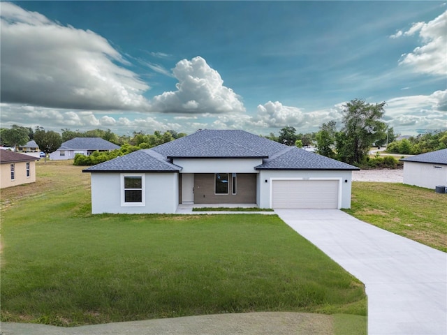 10107 SW 41st Ave, Ocala, FL 34476 - view of front of home featuring a garage, a front yard, stucco siding, and a shingled roof