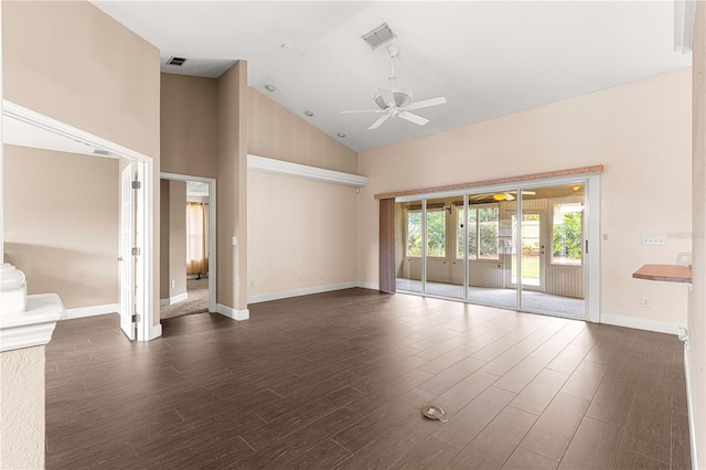 unfurnished living room featuring ceiling fan, dark wood-type flooring, and high vaulted ceiling