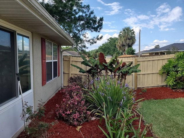view of yard featuring fence