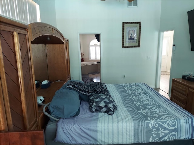 bedroom featuring ensuite bathroom