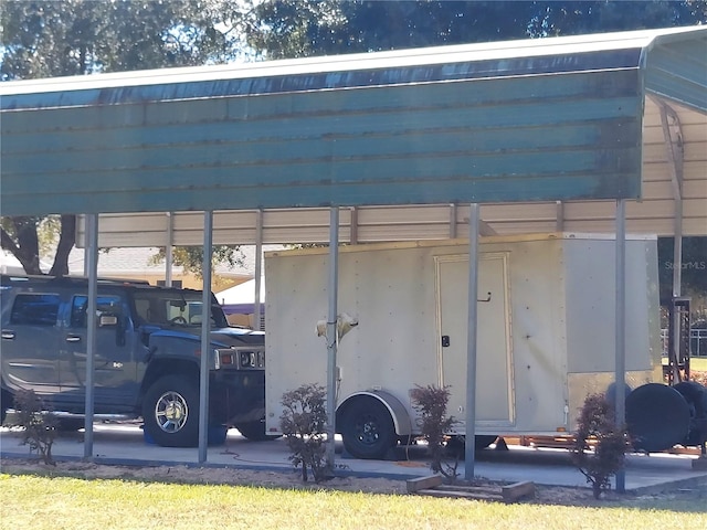 view of parking / parking lot with a carport