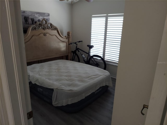 bedroom featuring hardwood / wood-style flooring