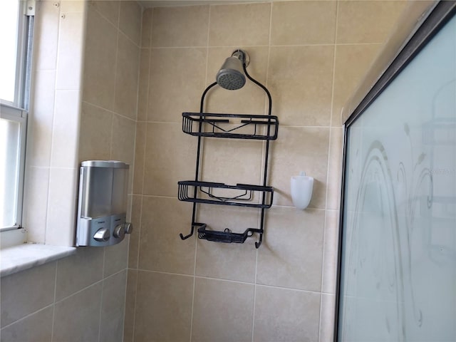 details featuring a shower with door