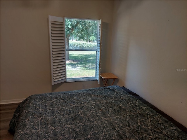 bedroom featuring wood-type flooring