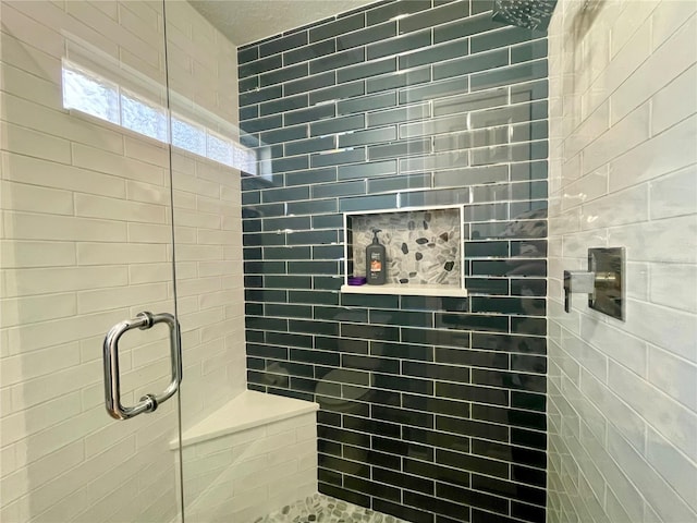 bathroom with an enclosed shower