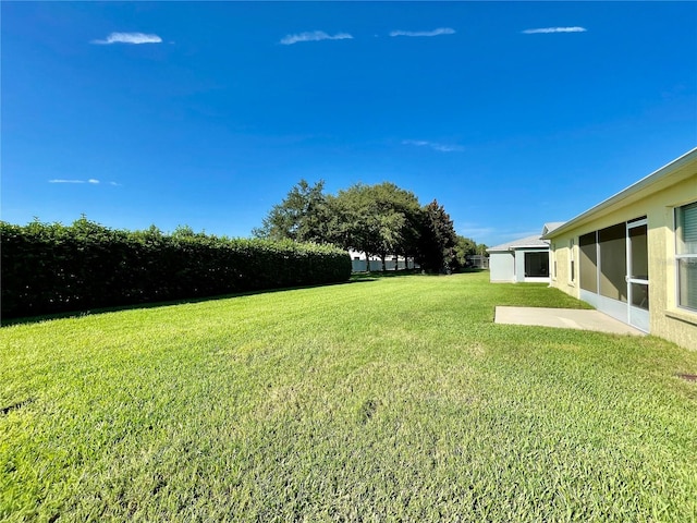 view of yard with a patio area