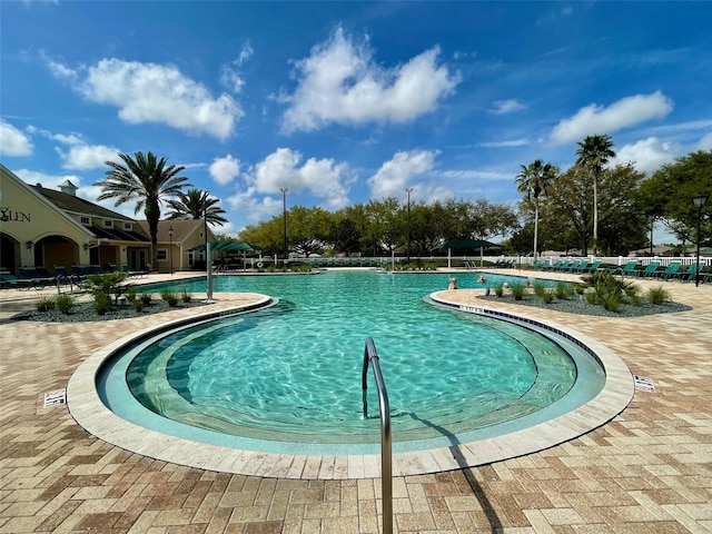 view of swimming pool featuring a patio