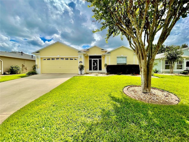 single story home with a front yard and a garage