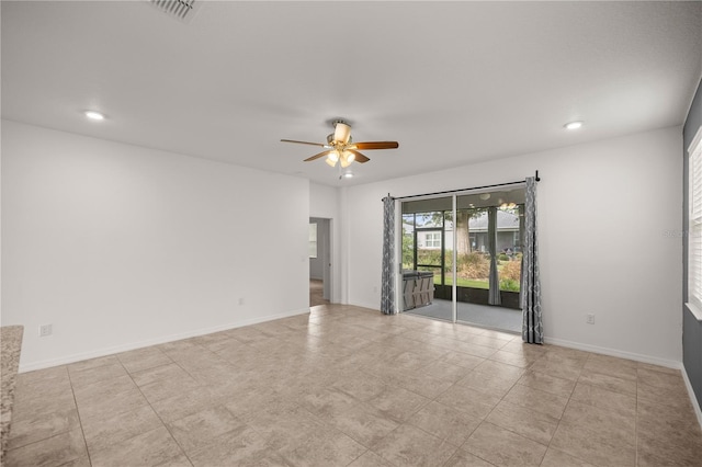 unfurnished room with ceiling fan