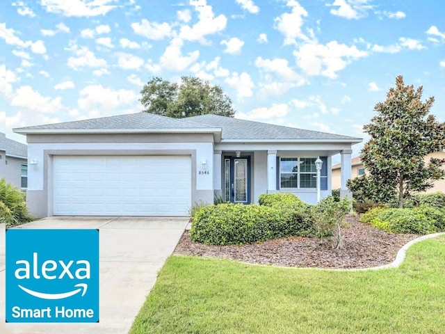 single story home featuring a garage and a front yard