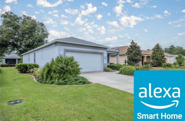 view of front of home with a front lawn and a garage