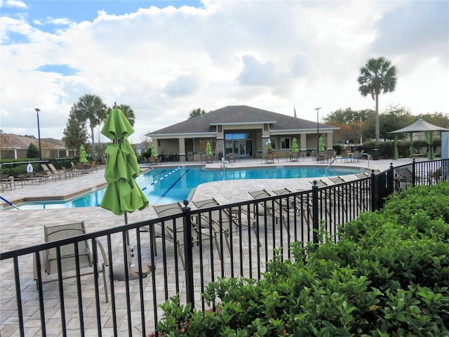 view of swimming pool with a patio area