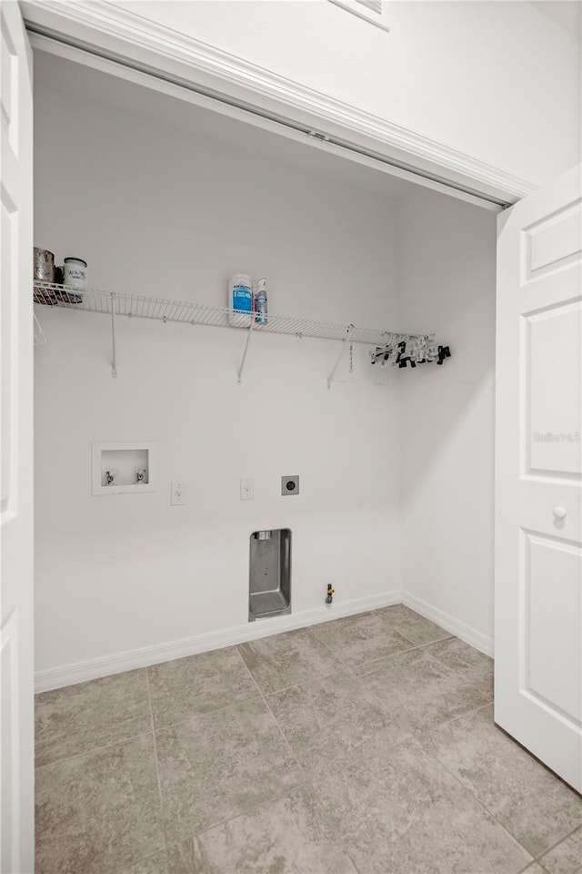 washroom with hookup for an electric dryer, gas dryer hookup, light tile patterned floors, and hookup for a washing machine