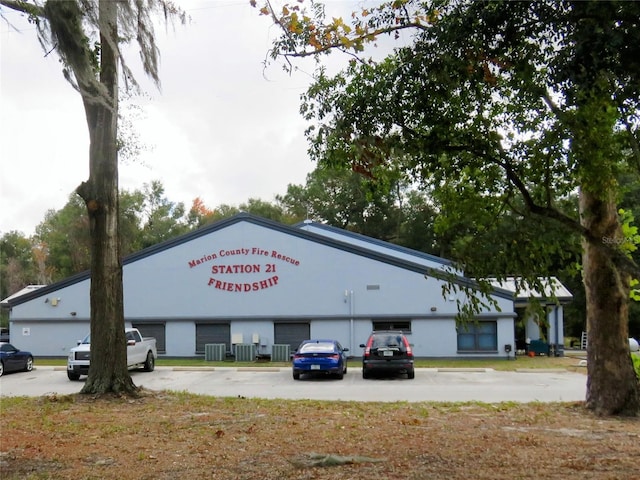 view of building exterior with cooling unit