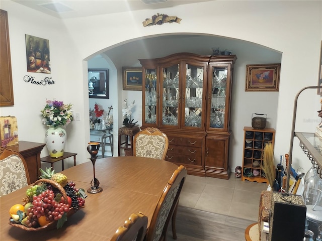 dining space with light hardwood / wood-style floors