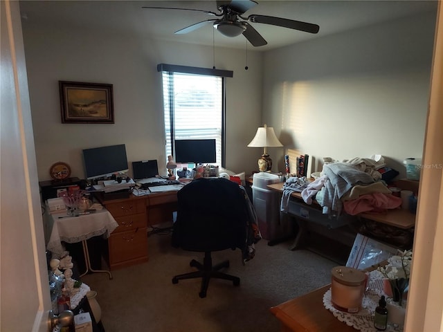 home office featuring carpet and ceiling fan