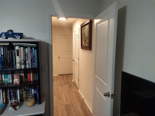 hallway featuring light wood-type flooring