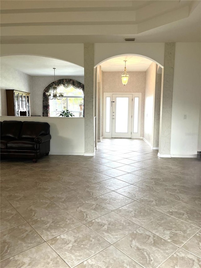 interior space featuring an inviting chandelier