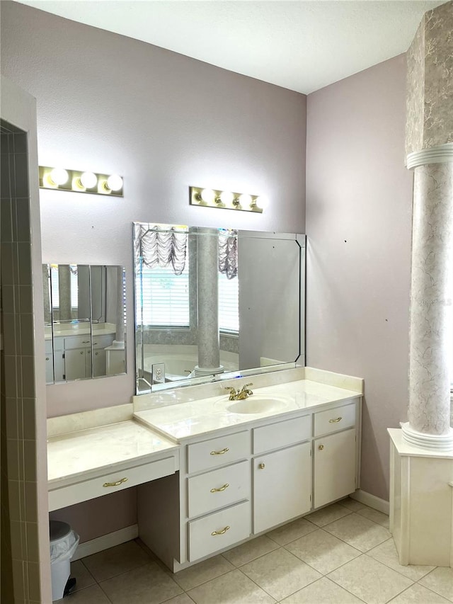 bathroom with vanity and tile patterned floors