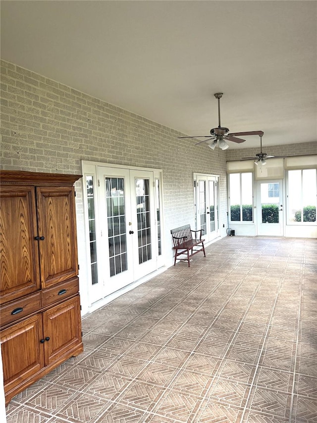 view of patio featuring ceiling fan and french doors