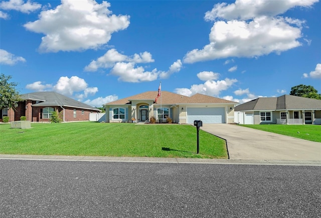 ranch-style house with a garage and a front yard