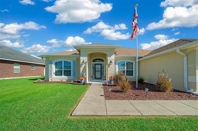 view of front of house with a front yard