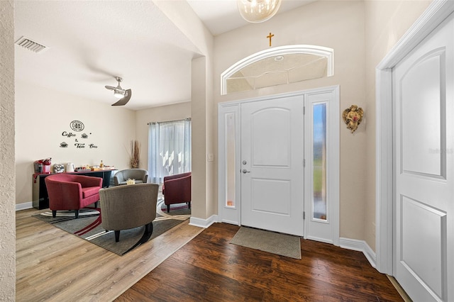 entrance foyer with dark wood-type flooring