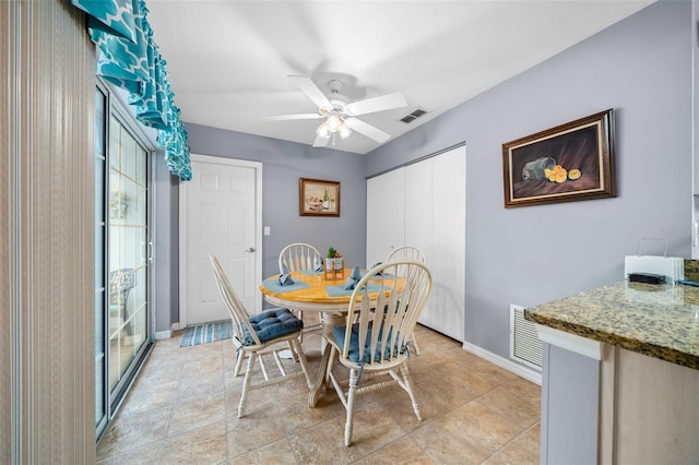 dining room with ceiling fan