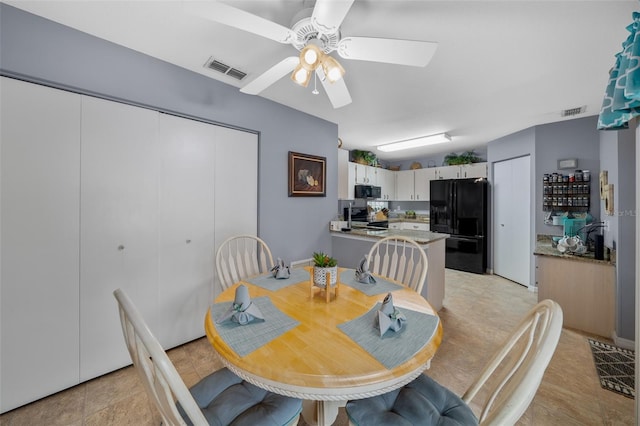 dining area featuring ceiling fan