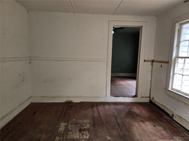 spare room with dark hardwood / wood-style flooring