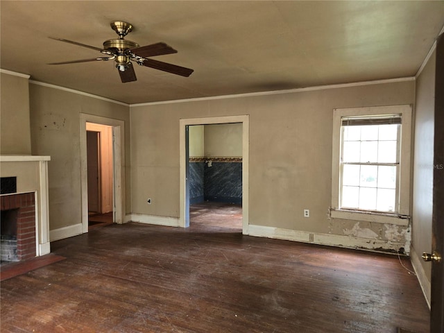 unfurnished living room featuring a fireplace, ornamental molding, dark wood-type flooring, and ceiling fan