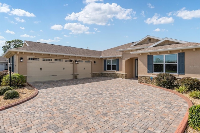 ranch-style home featuring a garage