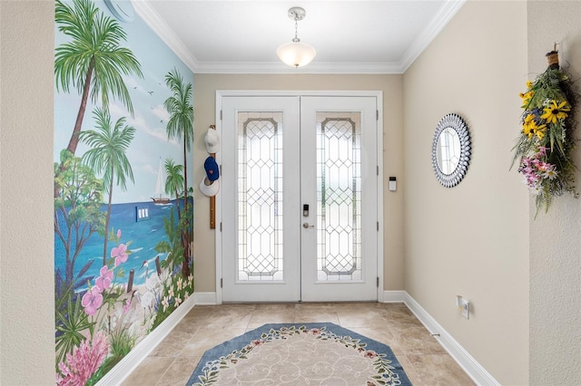 tiled foyer entrance featuring french doors and crown molding