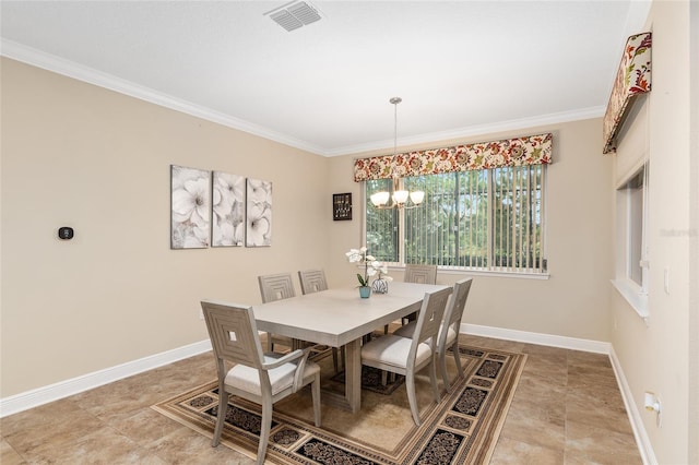 dining room featuring an inviting chandelier and ornamental molding