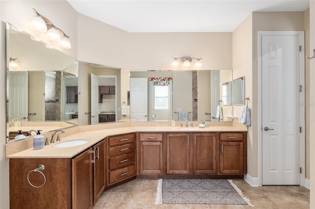 bathroom featuring vanity and a shower