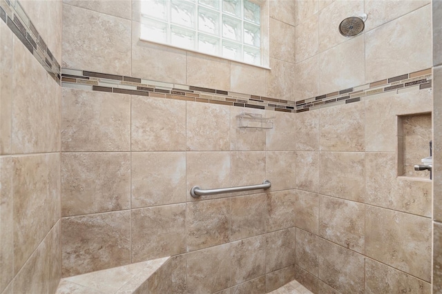 room details with a tile shower