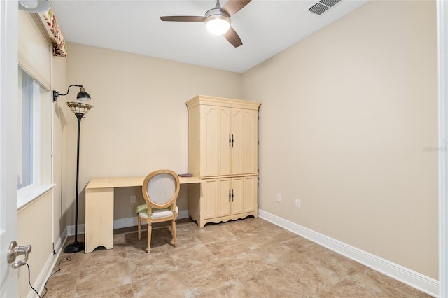 office area with ceiling fan