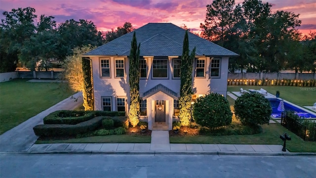 view of front of house with a lawn