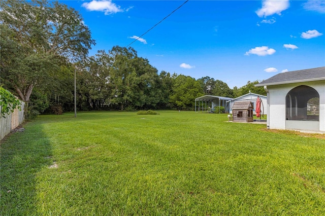 view of yard featuring a carport