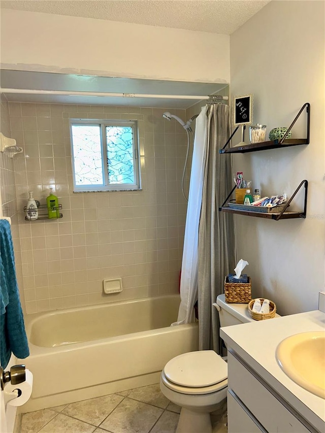 full bathroom with vanity, shower / bath combination with curtain, a textured ceiling, toilet, and tile patterned floors