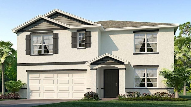 view of front of home featuring a garage and a front lawn