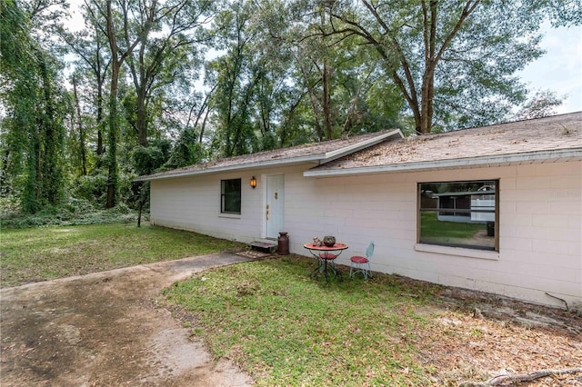 exterior space with a front yard