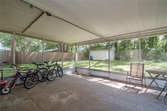 unfurnished sunroom featuring a wealth of natural light