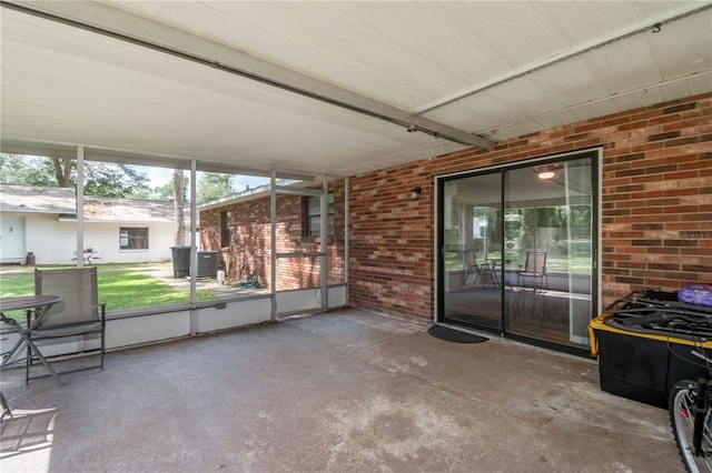 unfurnished sunroom featuring a wealth of natural light