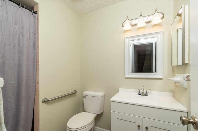 bathroom with a shower with curtain, a textured ceiling, vanity, and toilet