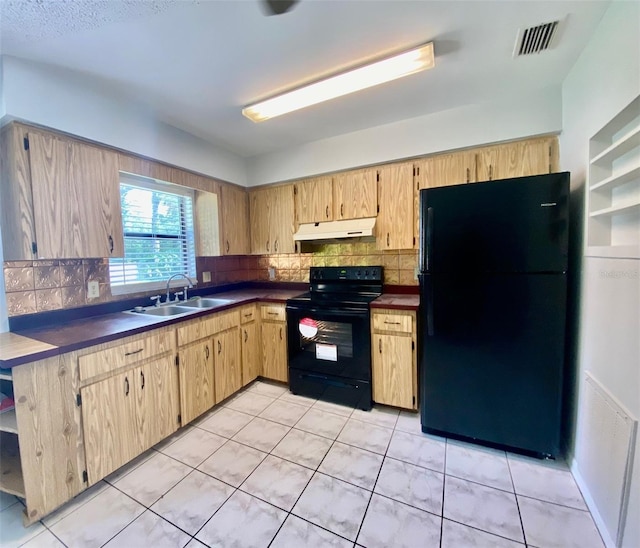 kitchen featuring light brown cabinets, sink, tasteful backsplash, and black appliances