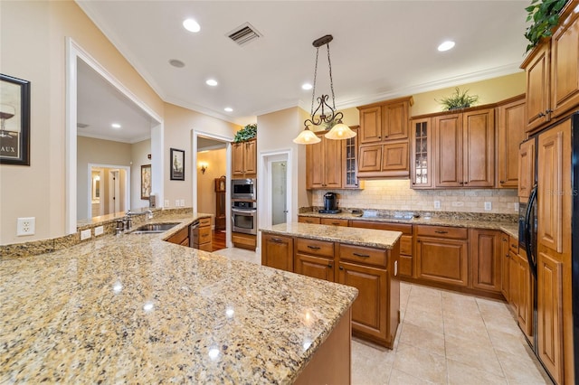 kitchen featuring light tile patterned flooring, stainless steel appliances, pendant lighting, crown molding, and light stone counters