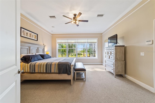 carpeted bedroom with crown molding and ceiling fan