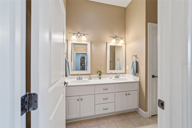 bathroom with vanity and tile patterned floors